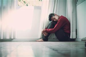 Man sitting on floor